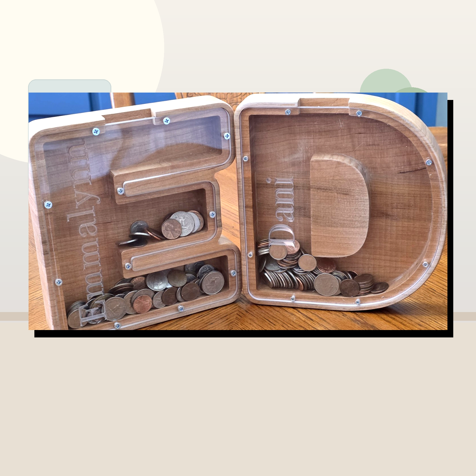 Clean staged wooden letter coin banks by Vega Woodwork